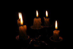 Light of five candles in darkness