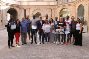 Nella foto, il gruppo dei giovani beneficiari di protezione internazionale che hanno prestato attività di volontariato negli orti sociali